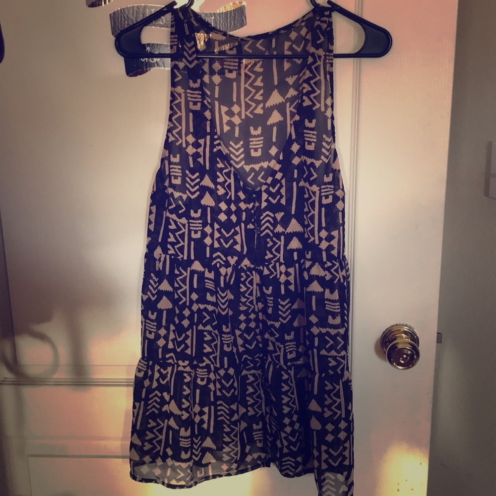 Beige and black see through tank